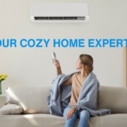 woman-with-remote-near-air-conditioner-OBoys-Heating-And-Air-ductless-heating-and-ac-services-advantages