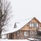 log cabin style home in the winter - O'Boys Heating & Air boiler